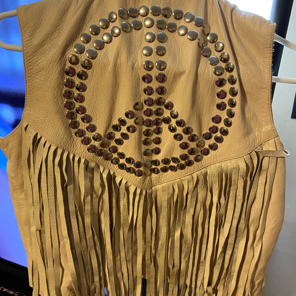 Medium size leather vest with peace logo on the back. Freepeople..Sold